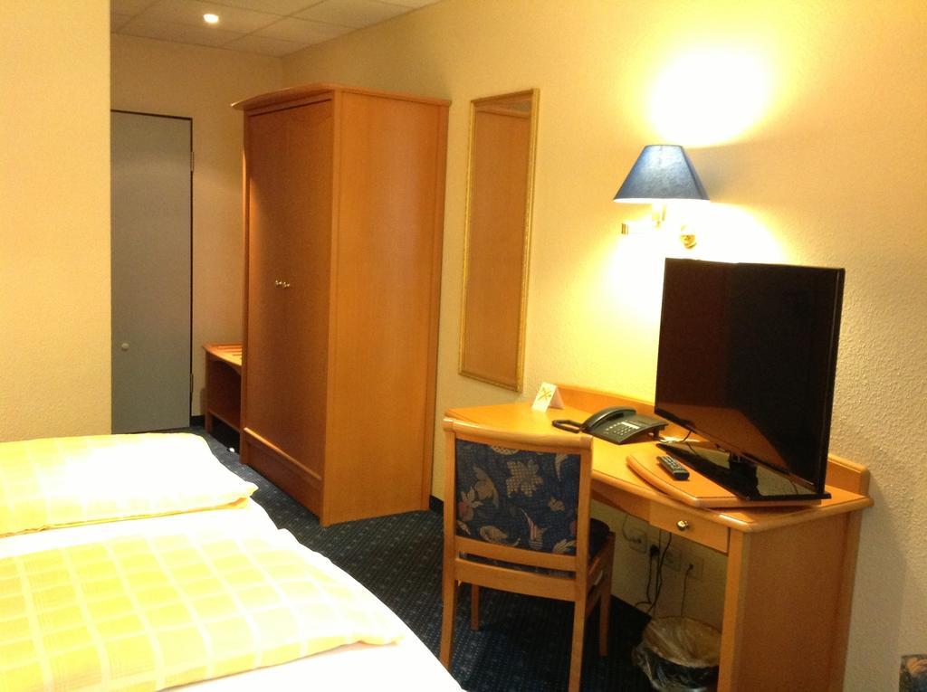 Duenenhotel Am Meer Rostock Quarto foto